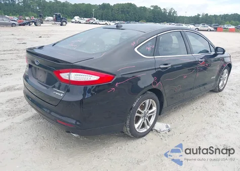 2015 Ford Fusion Hybrid Titanium z USA, uszkodzony, nr VIN 3FA6P0RU0FR218532